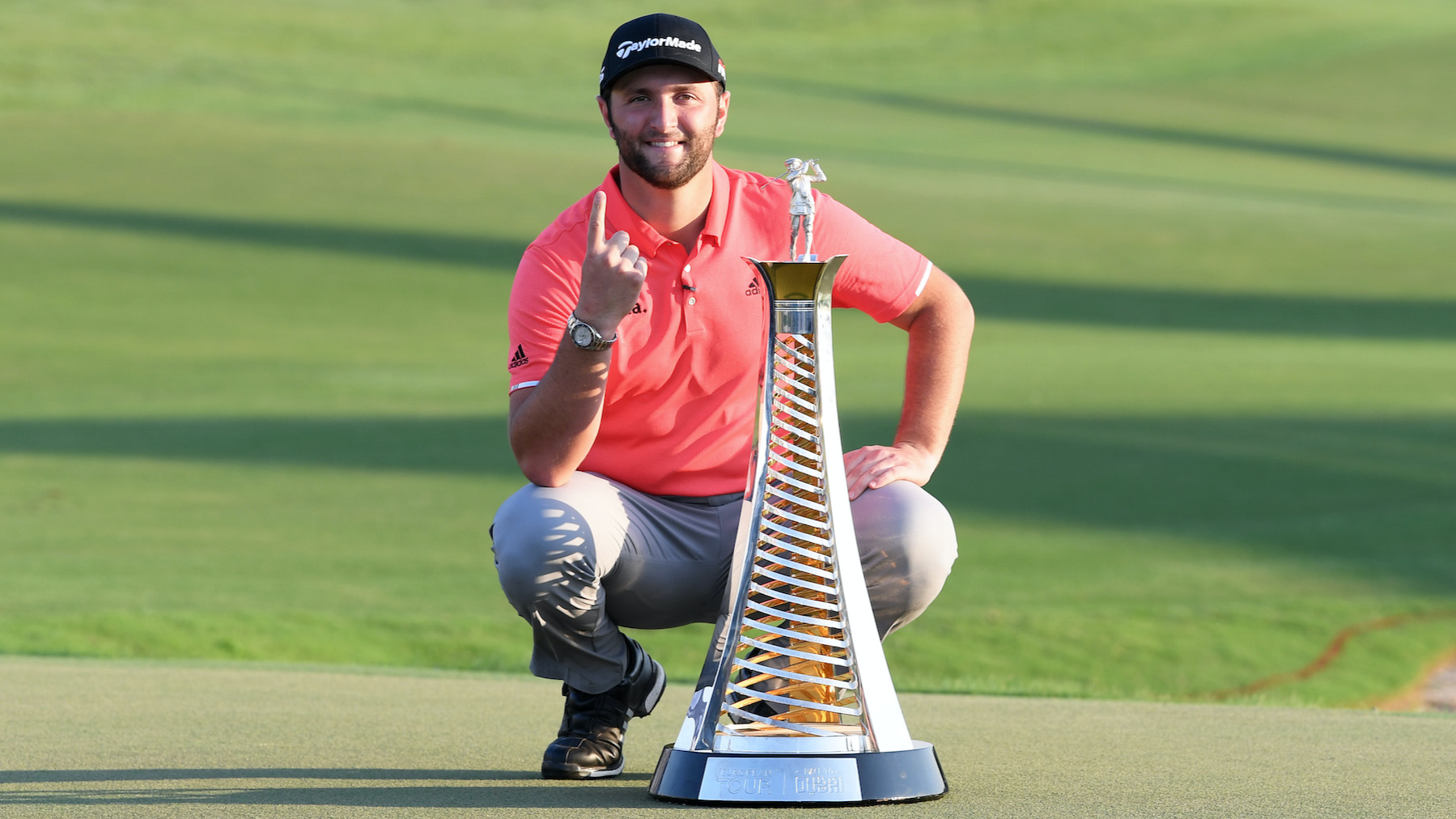 DUBAI, UNITED ARAB EMIRATES - NOVEMBER 24: Jon Rahm of Spain poses with the Race to Dubai trophy following his victory during Day Four of the DP World Tour Championship Dubai at Jumerirah Golf Estates on November 24, 2019 in Dubai, United Arab Emirates. (Photo by Ross Kinnaird/Getty Images)