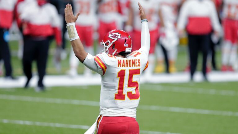 Kansas City Chiefs quarterback Patrick Mahomes (15) reacts after a touchdown by running back Le'Veon Bell in the second half of an NFL football game against the New Orleans Saints in New Orleans, Sunday, Dec. 20, 2020. (AP Photo/Brett Duke)